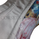 Close-up of a corset with floral design on a white background